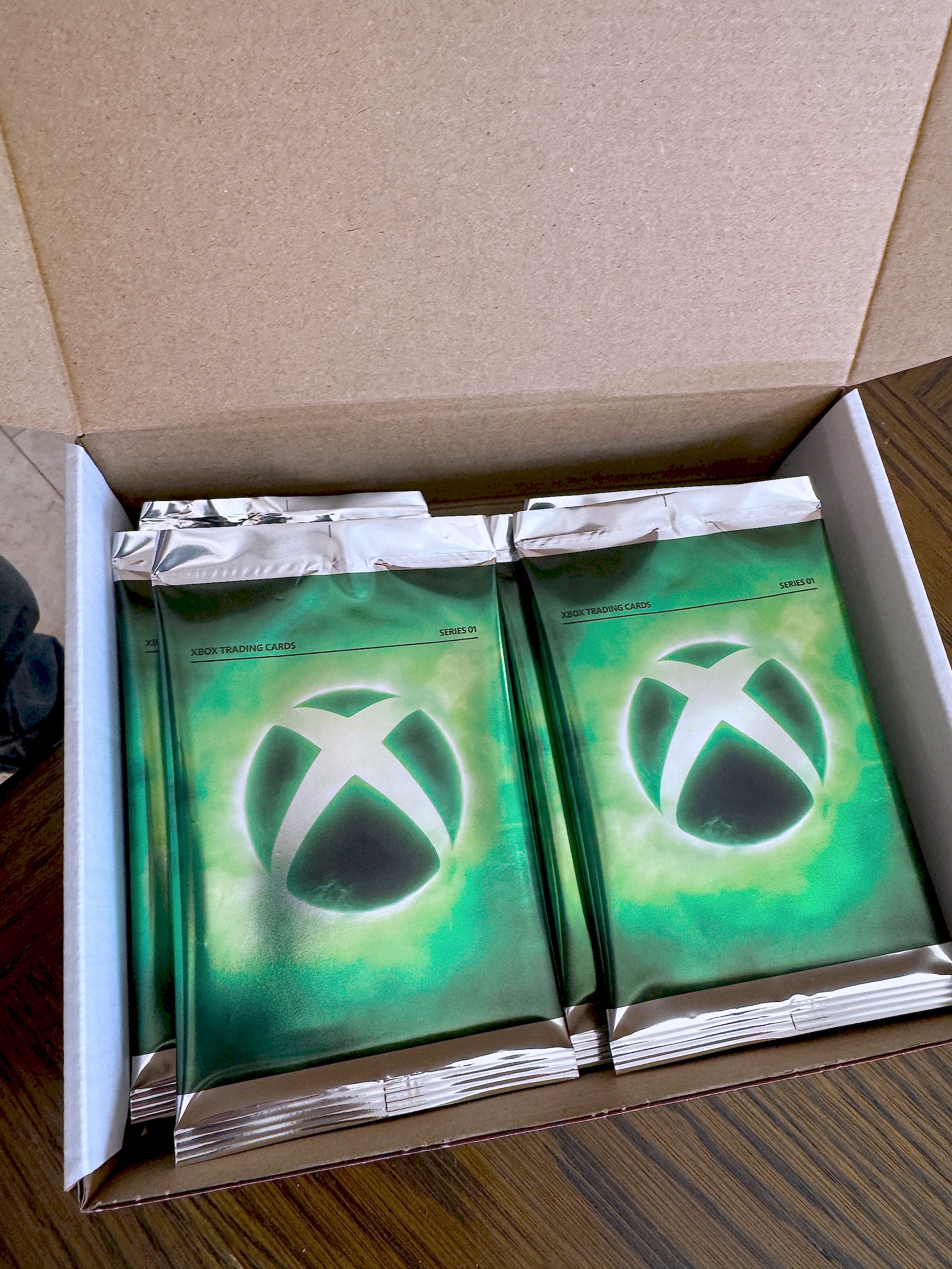 Sealed foil packs nested in the shipping box, ready to go out